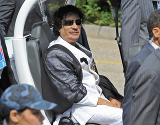 Illustration for article titled G8 Leaders Look Silly Shuttled Around In GEM Electric Cars
